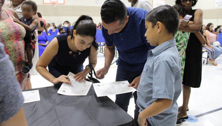 3rd grade students at Bernard Black Elementary School being offered the College Promise Scholarship by the Rosztoczy Foundation. (Courtesy: Roosevelt School Disrict)