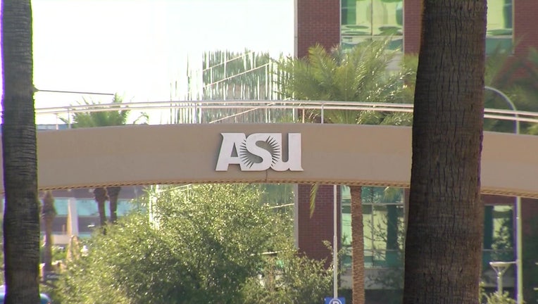 ASU Logo over a pedestrian bridge at the school's campus in Tempe.