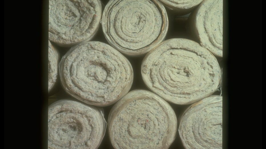Rolls of natural cotton and recycled terracotta