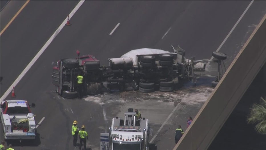 SkyFOX is over State Route 51 near Thomas Road in Phoenix, where a cement truck rolled over and spilled fuel and concrete onto the freeway. 