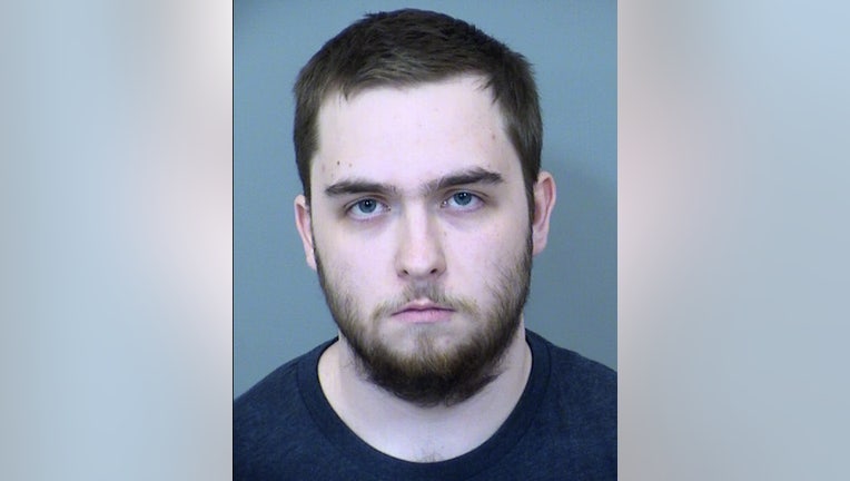 Scottsdale man accused of downloading images, video that depict sexual acts involving minors Austin Bretz
