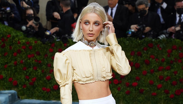 Pop Crave on X: Emma Chamberlain on the way to the 2022 #MetGala.   / X