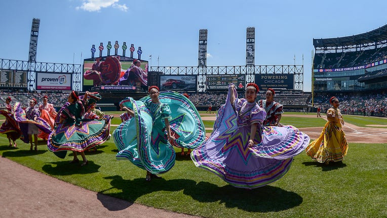 Members of the Ballet Folklorico Mexico Lindo perform in celebration of Cinco de Mayo before a game between the Chicago White Sox and the Boston Red Sox on May 5, 2019 in Chicago Illinois. (Photo by Quinn Harris/Icon Sportswire via Getty Images)