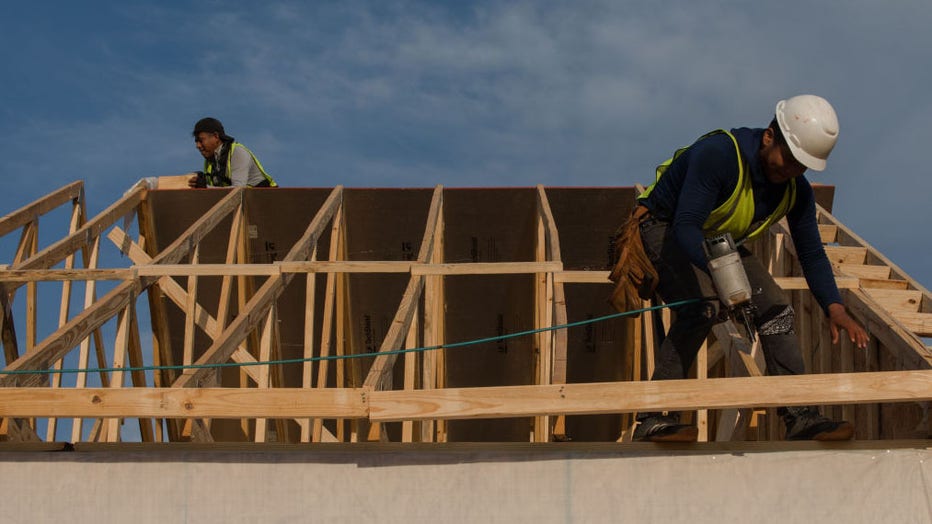 Construction-workers-build-home.jpg