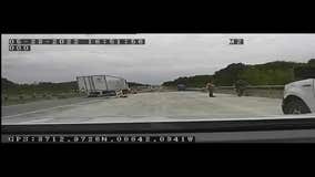 Video shows Illinois officer, highway worker save man from jumping off bridge