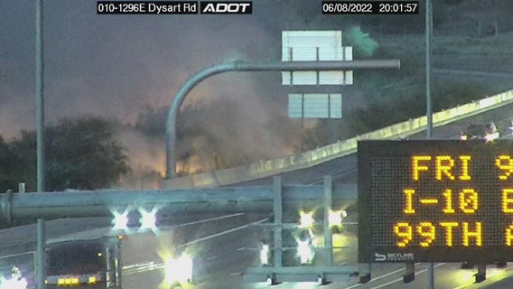 Crews battling wildfire on river bottom in Goodyear