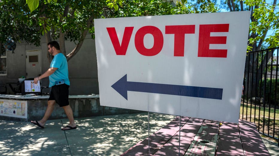 347a101c-Voters cast their ballots in the California primary election