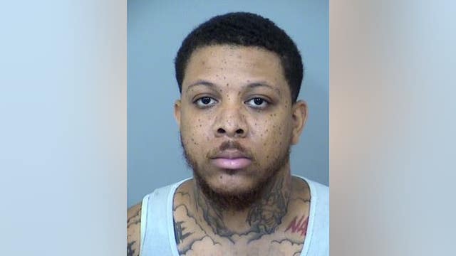 Phoenix man found dead in front yard of home, suspect arrested