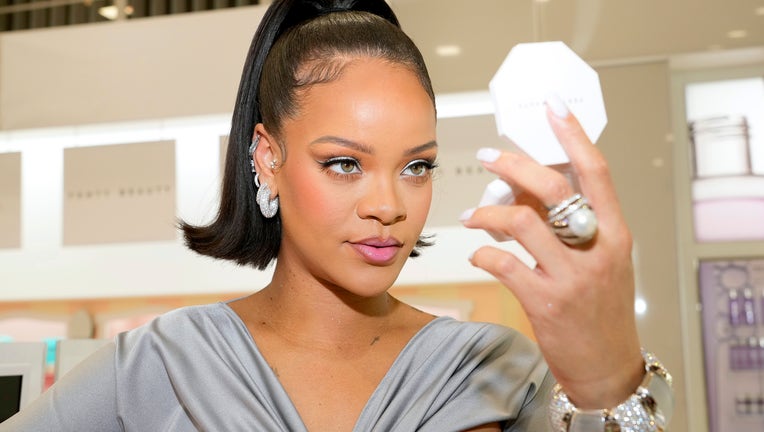 Rihanna is worth $120 MILLION but carries least expensive Louis