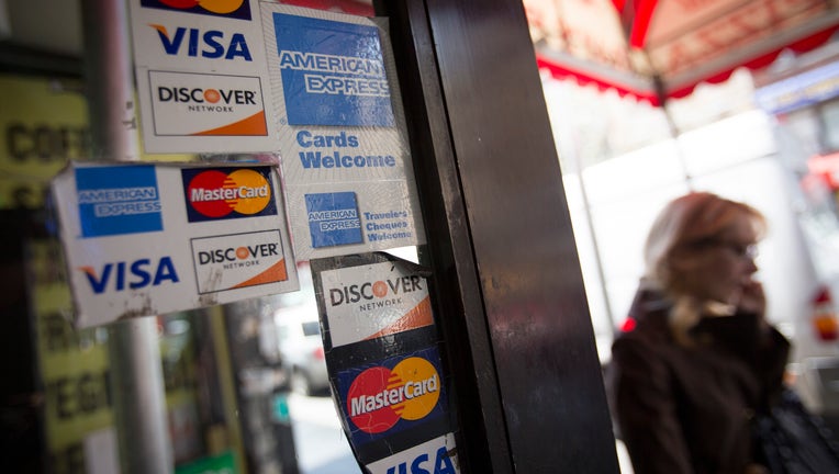 American Express Co. Credit Cards & Signage Ahead Of Earns Figures
