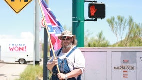 Armed Trump supporters protest outside of FBI office in Phoenix following Mar-a-Lago probe