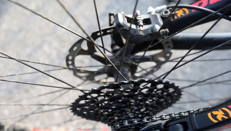 Close up of moutain bike  chain and gears.  France.