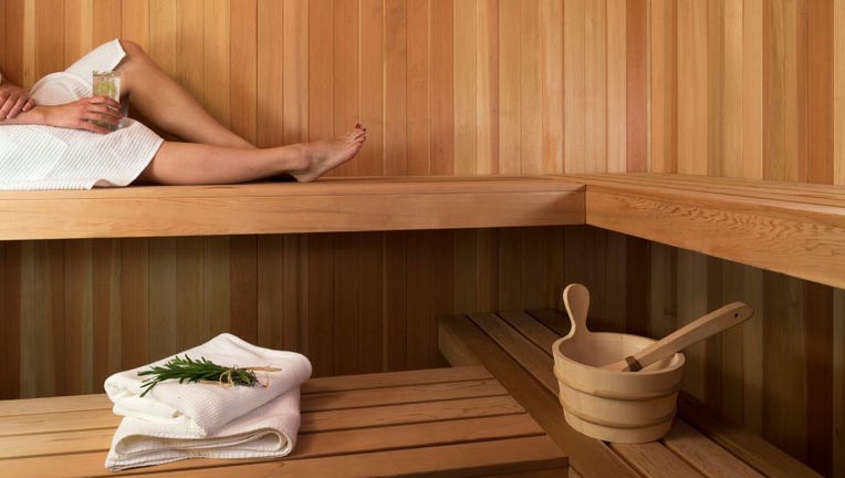 Woman is Sauna with Drinks and Herbs, Blair Mountain Lodge, Greenville, Maine
