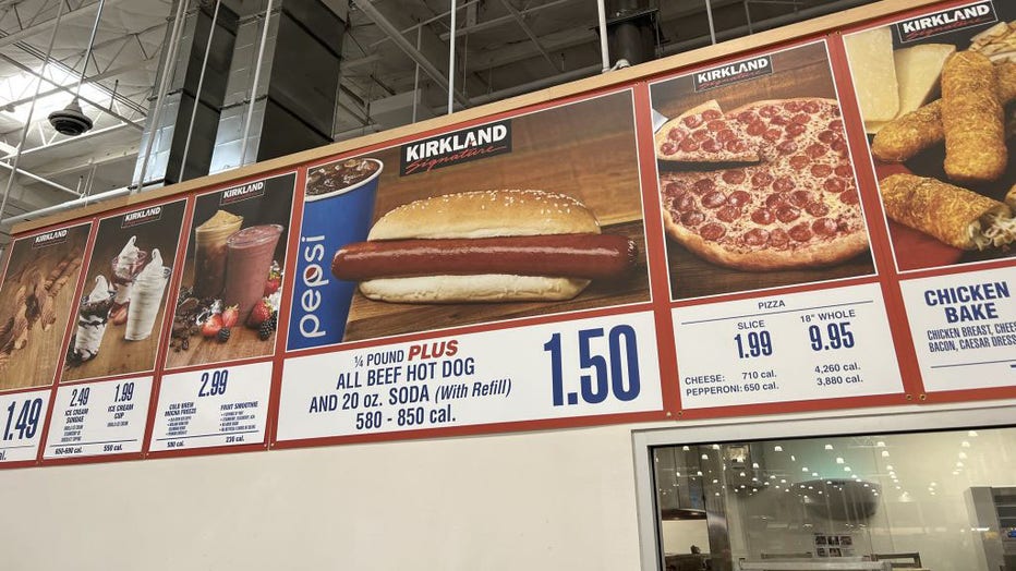 FILE - Close-up of signs listing prices at Costco food court, including the price for Costco's hot dog and fountain soda combination, in Danville, California, on July 3, 2022. (Photo by Smith Collection/Gado/Getty Images)