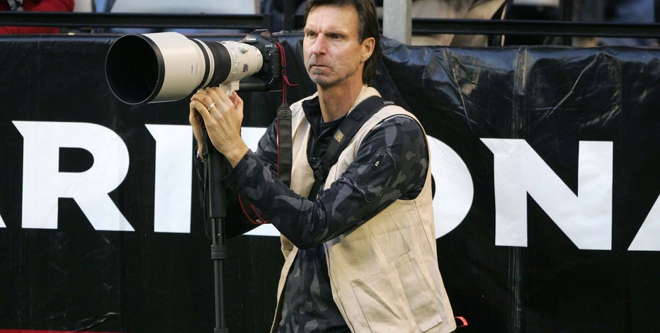 Picture of MLB Great Randy Johnson Photographing NFL Game Goes Viral -  Sports Illustrated