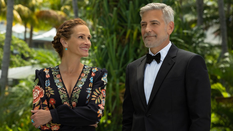 (from left) Georgia (Julia Roberts), David (George Clooney) in Ticket to Paradise, directed by Ol Parker. Photo: Vince Valitutti/Universal Studios