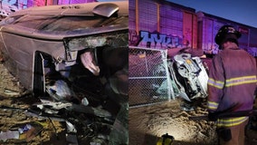 Surprise driver hit by train extricated from car and rushed to the hospital