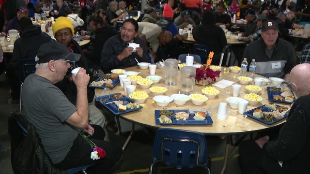 On Thanksgiving, St. Vincent de Paul giving a hot meal to those in need