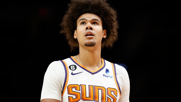 Phoenix Suns forward Cam Johnson injures knee, could miss extended time