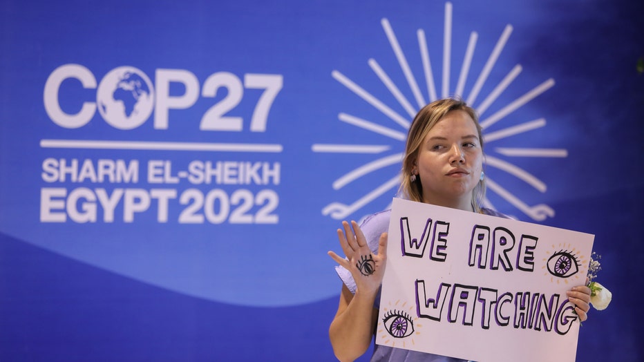 A climate activist takes part in the demonstration in front of International Convention Center to protest the negative effects of climate change, as the UN climate summit COP27 continues in Sharm el-Sheikh, Egypt on November 19, 2022. (Photo by Mohamed Abdel Hamid/Anadolu Agency via Getty Images)