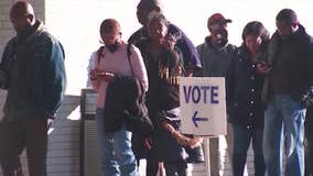 Group to deploy armed guards near Georgia polling places during Senate runoff