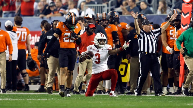 Wisconsin beats Oklahoma State 24-17 in Guaranteed Rate Bowl