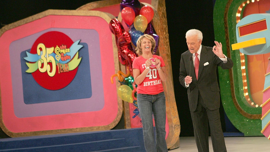 05b1bd95-Price-is-Right-Bob-Barker-and-contestant.jpg
