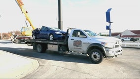 Denny's sign falls on top of car, killing 1, injuring 2