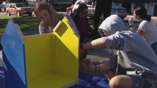 Little library built & dedicated to a Phoenix family killed in an apparent murder-suicide