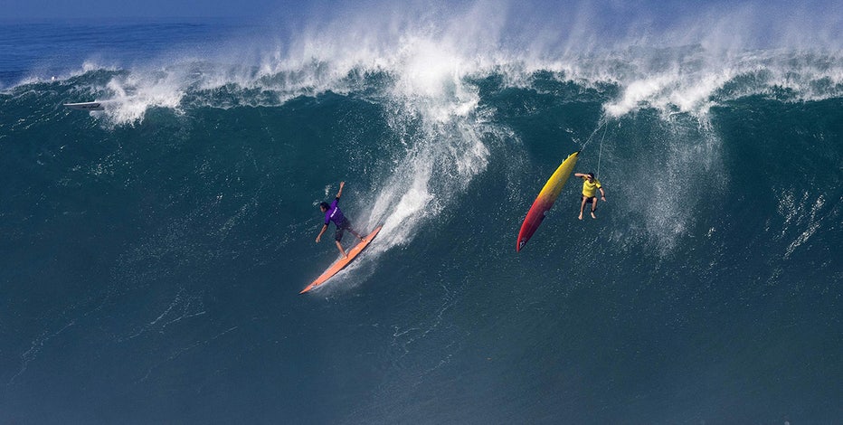 Wipeout: Huge waves crash into crowd at Hawaii surf competition