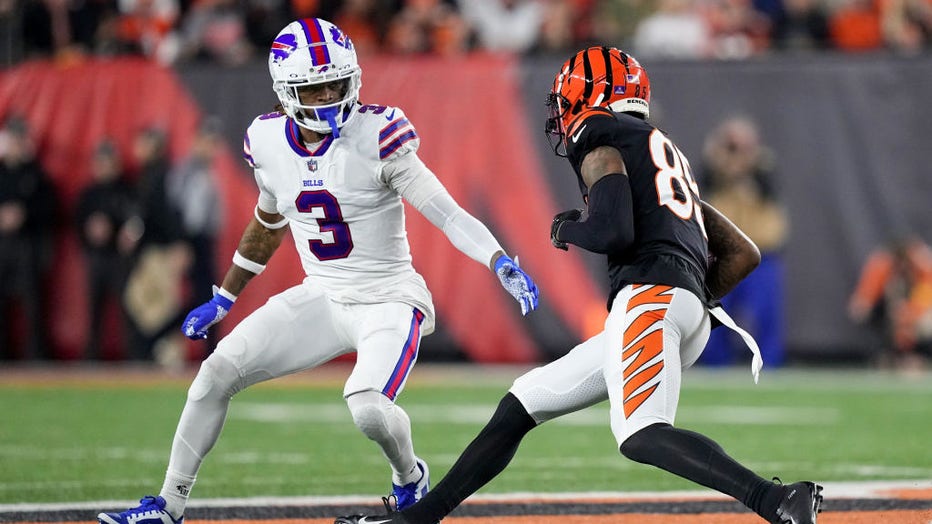 Tee Higgins #85 of the Cincinnati Bengals runs with the ball while being chased by Damar Hamlin #3 of the Buffalo Bills in the first quarter at Paycor Stadium on Jan. 2, 2023, in Cincinnati, Ohio. (Photo by Dylan Buell/Getty Images)