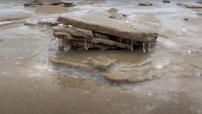 Mysterious sand slabs appearing on Lake Michigan beach
