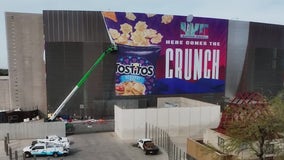 Behind the scenes of taking down massive Super Bowl LVII signs on Phoenix buildings
