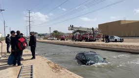 Woman rescued after driving into south Phoenix canal