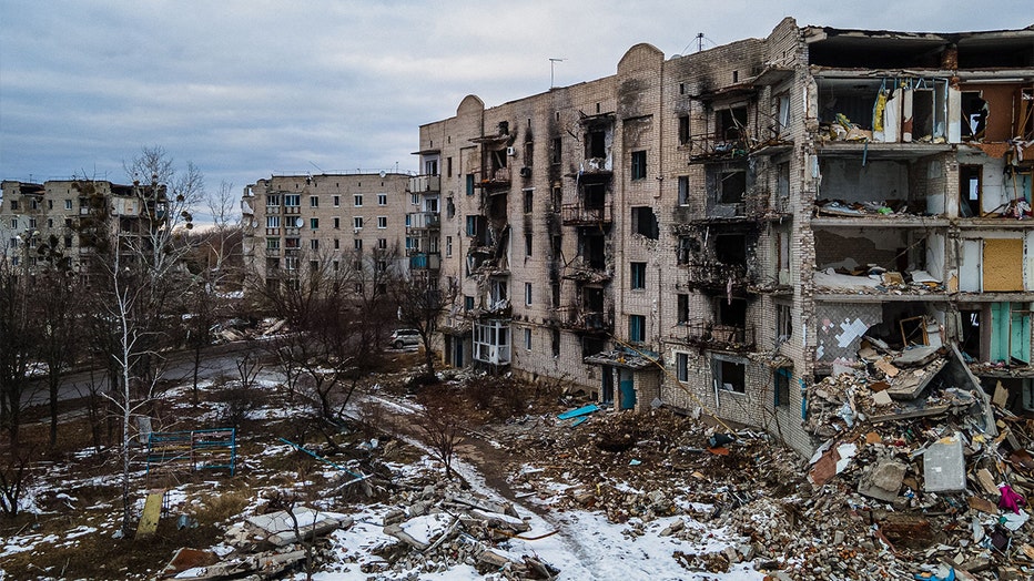 An aerial view shows residential buildings damaged by shelling in Izyum, Kharkiv region on February 20, 2023, amid the Russian invasion of Ukraine. (Photo by IHOR TKACHOV/AFP via Getty Images)