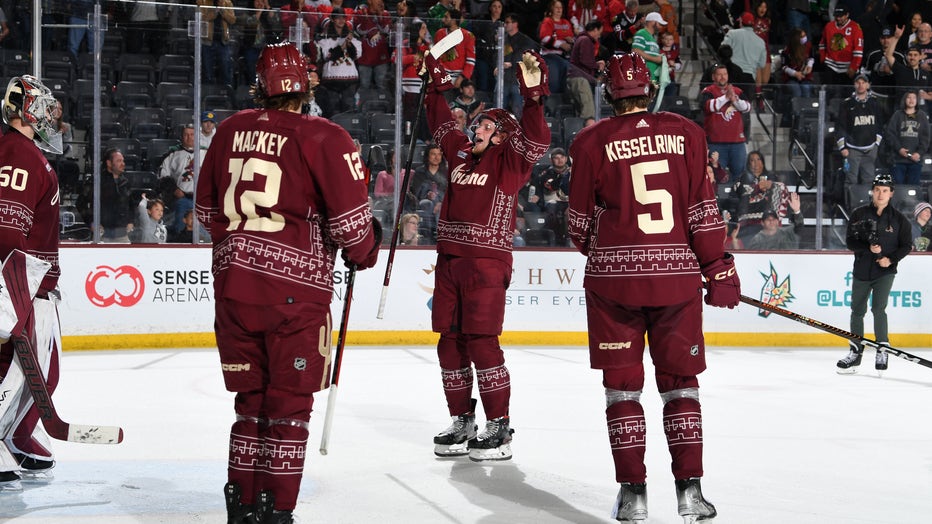 Juuso Valimaki #4 of the Arizona Coyotes celebrates after a 4-2 win against the Chicago Blackhawks at Mullett Arena on March 18, 2023 in Tempe, Arizona. (Photo by Norm Hall/NHLI via Getty Images)