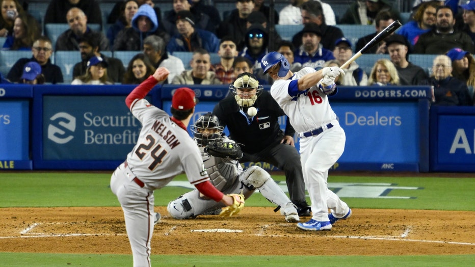 Dodgers' offense hot on chilly night in 8-2 win over D-backs
