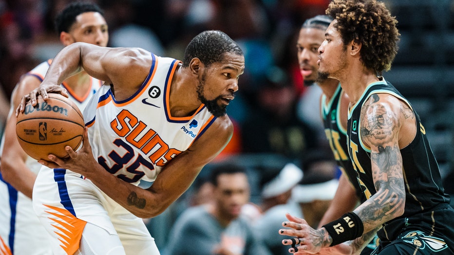 Phoenix Suns v Charlotte Hornets