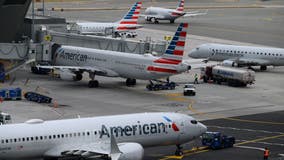 American Airlines, seeking new contract, vote to OK strike