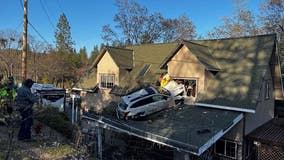 So many questions: How did car land on 2-story roof in Northern California?