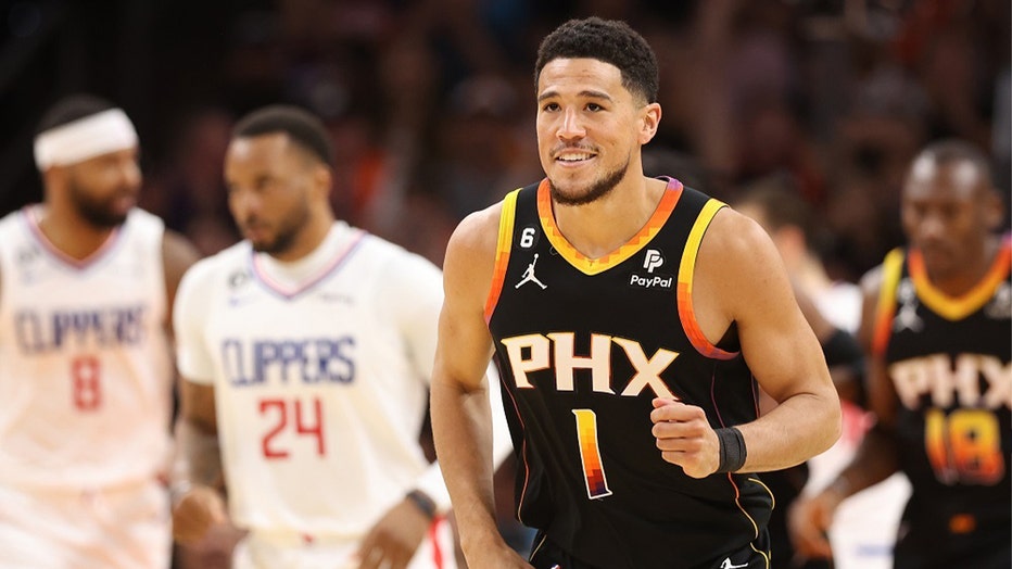 Devin Booker of the Phoenix Suns reacts during the second quarter against the LA Clippers in game five of the Western Conference First Round Playoffs at Footprint Center on April 25, 2023 in Phoenix, Arizona. (Photo by Christian Petersen/Getty Images)