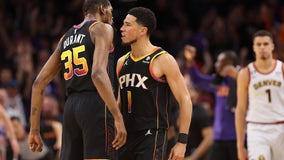 Booker scores 47, Durant adds 39, Suns beat Nuggets 121-114