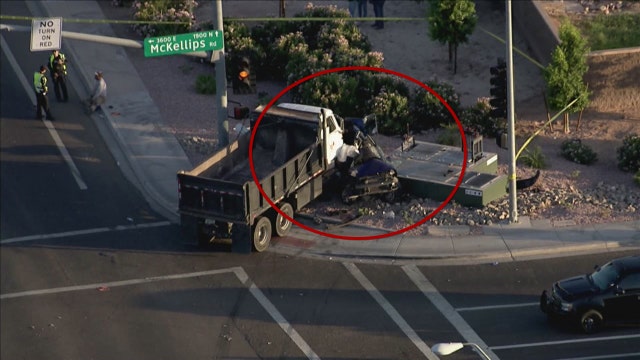 Crash involving dump truck sends woman, child to hospital