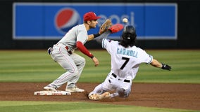 Diamondbacks withstand Realmuto hitting for the cycle to beat Phillies 9-8