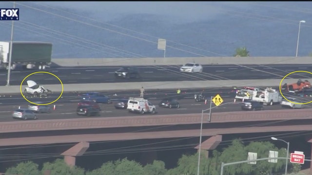 Rollover crash causes traffic backup on Loop 202