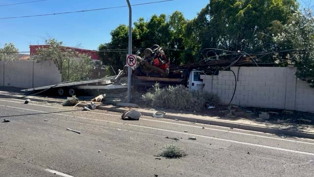 Truck crashes into wall, knocks down power lines in Mesa