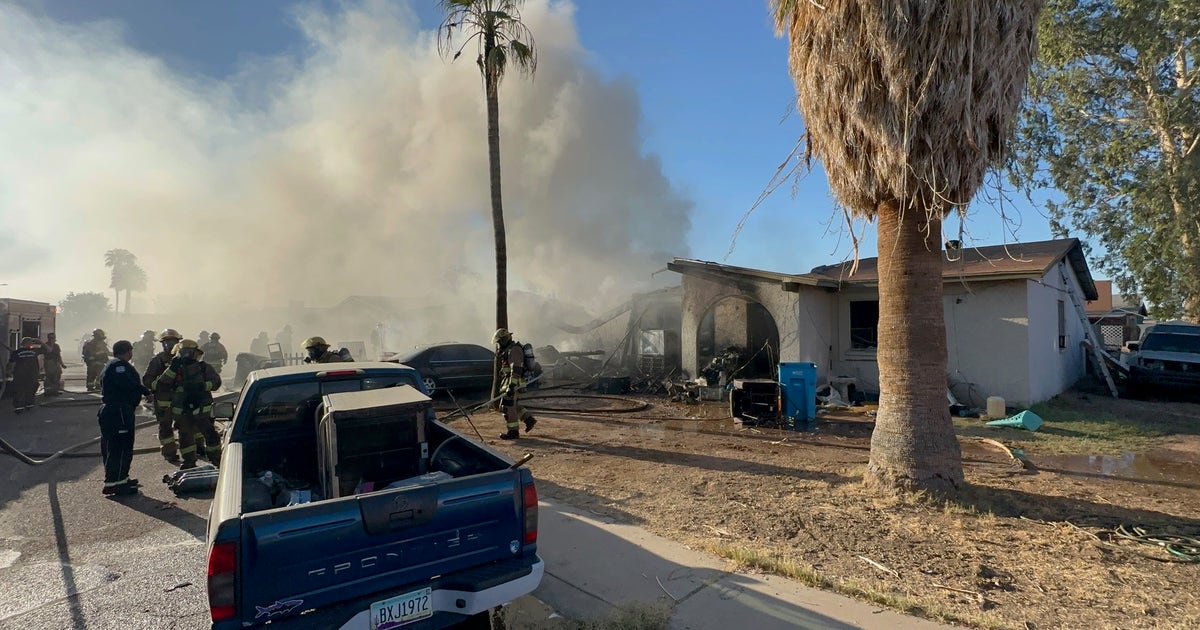 Phoenix firefighter hurt, 12 displaced after double house fire | FOX 10 ...