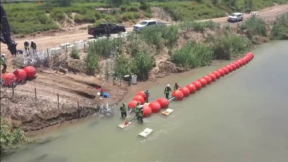 Justice Department tells Texas that floating barrier on Rio Grande raises humanitarian concerns