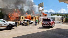 Arizona firefighter burned while battling commercial fire