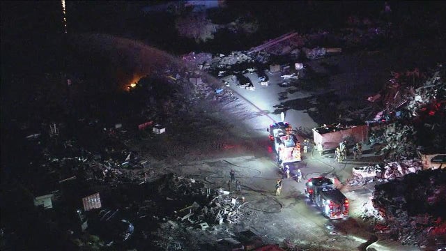 Fire breaks out at a Phoenix scrapyard sending smoke into the air